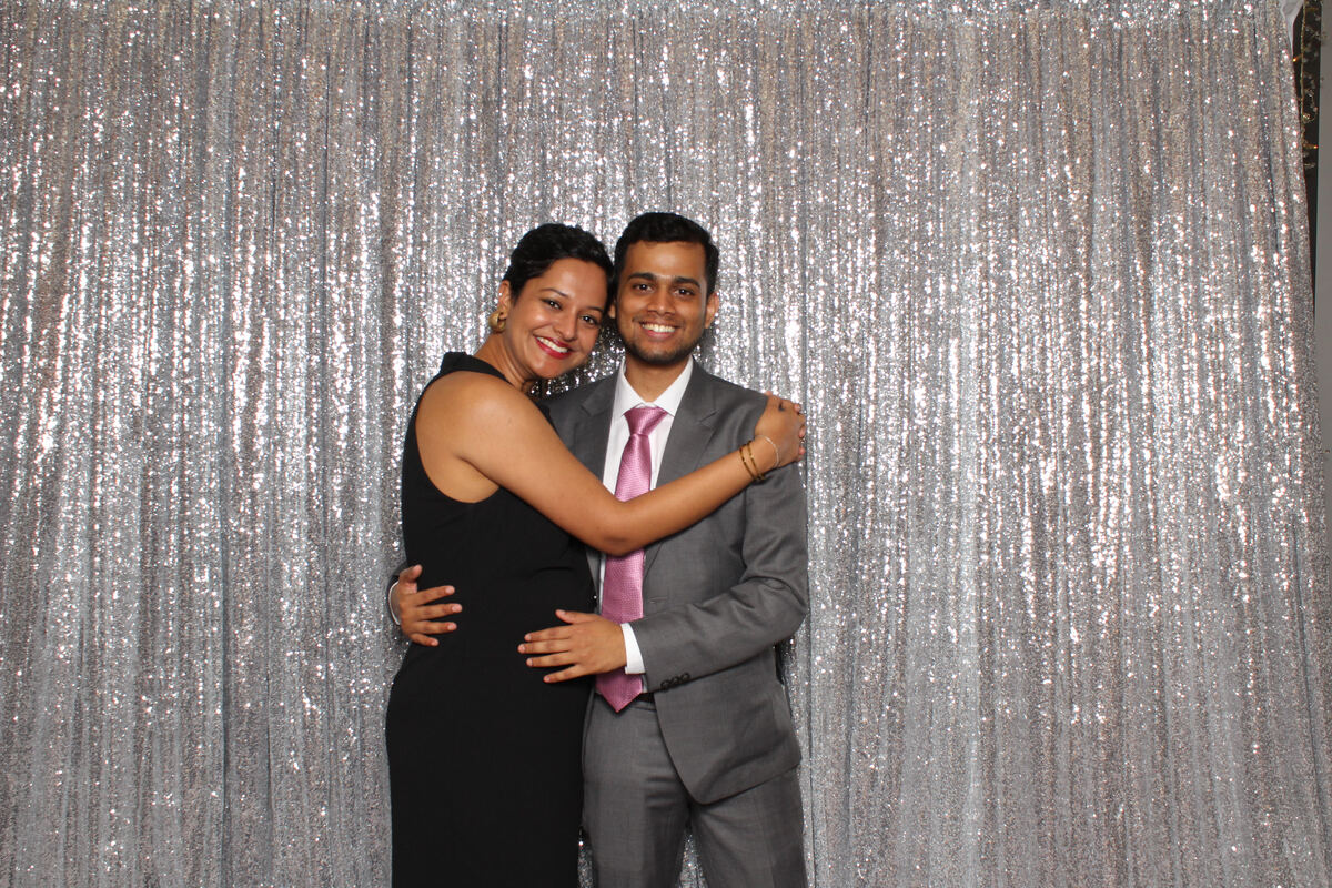 Soumen and Nikita smiling together at a formal event
