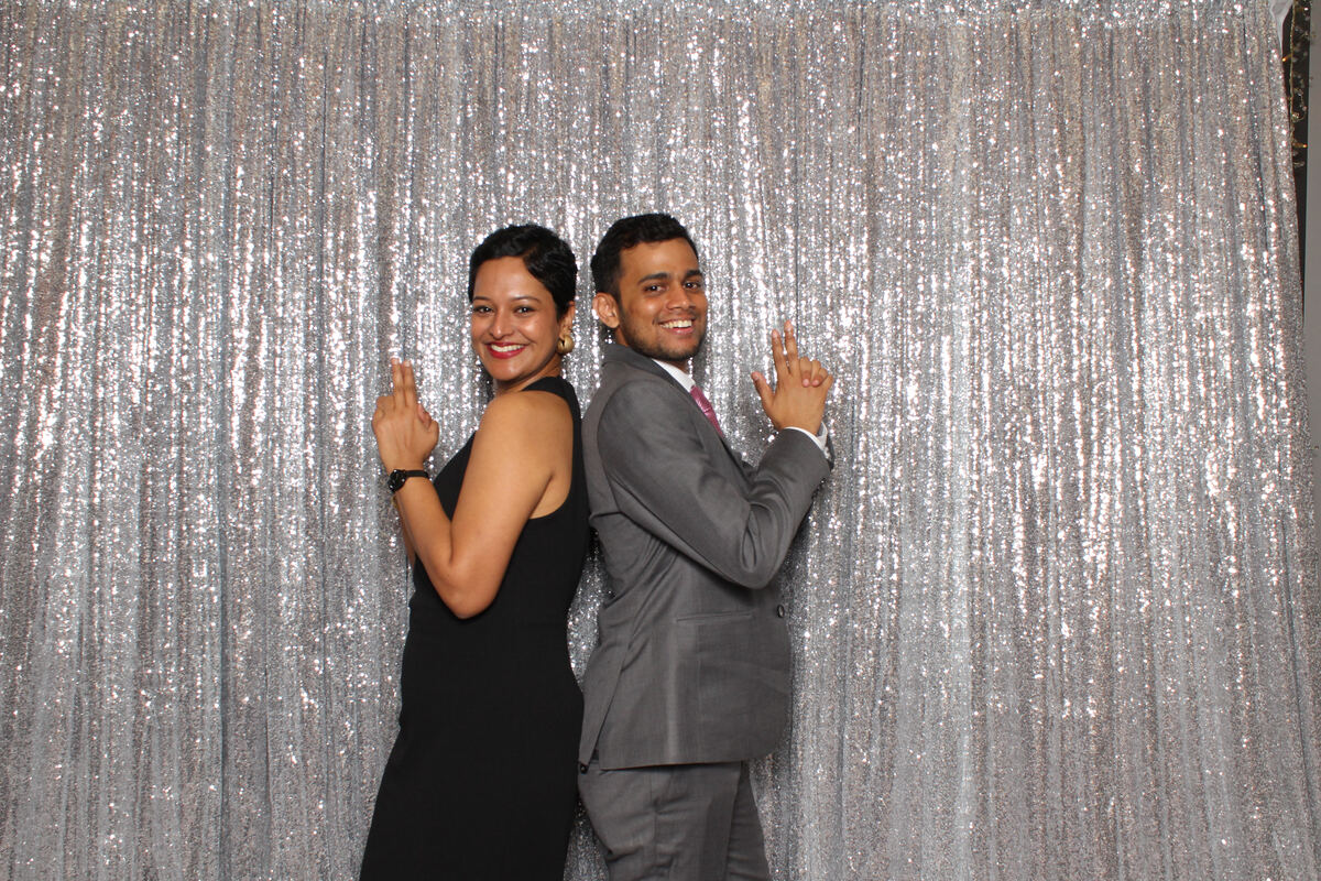 Soumen and Nikita posing playfully back to back