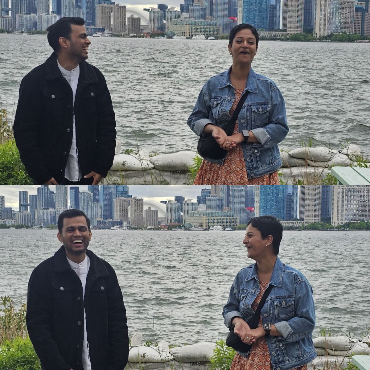 Soumen and Nikita laughing together by the Toronto waterfront